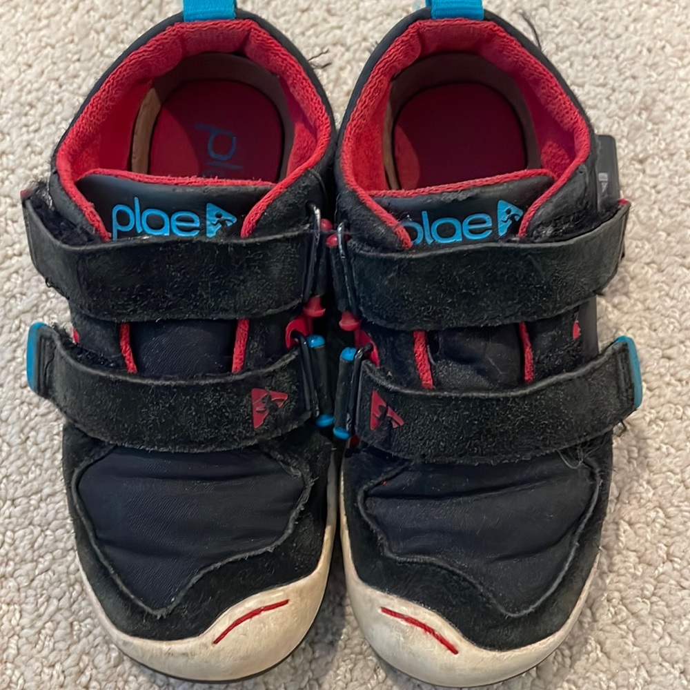 Plae shoes size 9.5 black, red, and blue